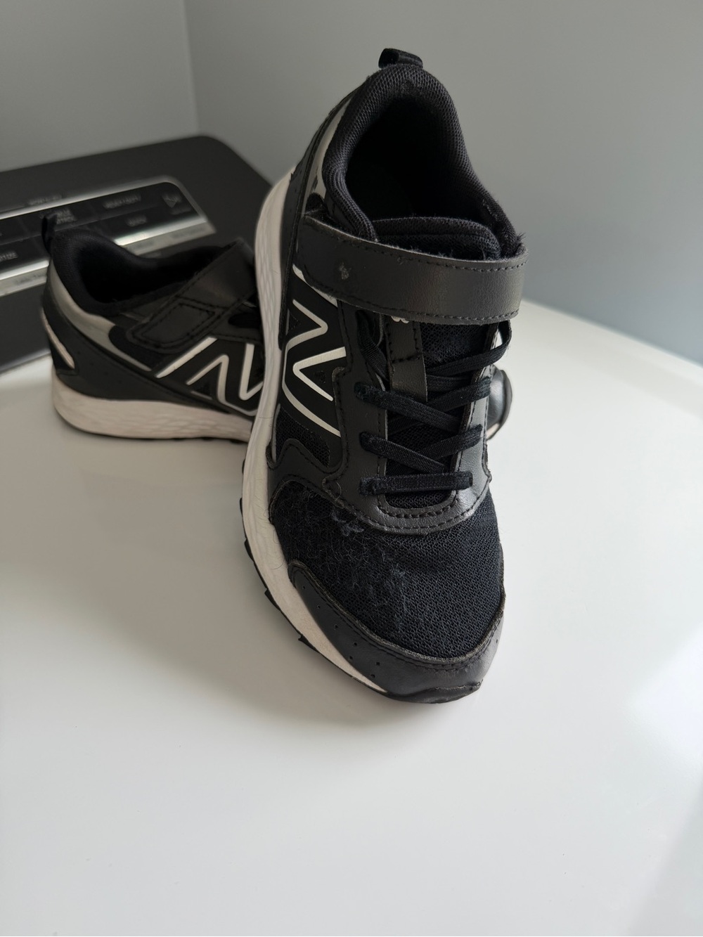 New Balance Kids Black and White Sneakers